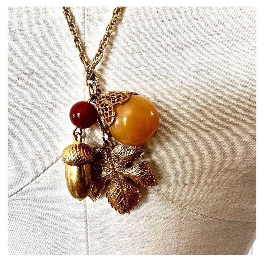 Carnelian gold tone acorn leaf charm necklace
